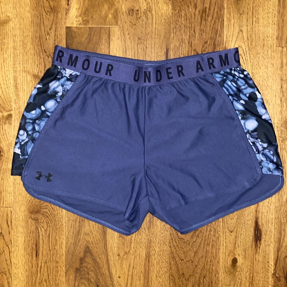 Women’s size Large Under Armour running shorts. Loose/Heatgear